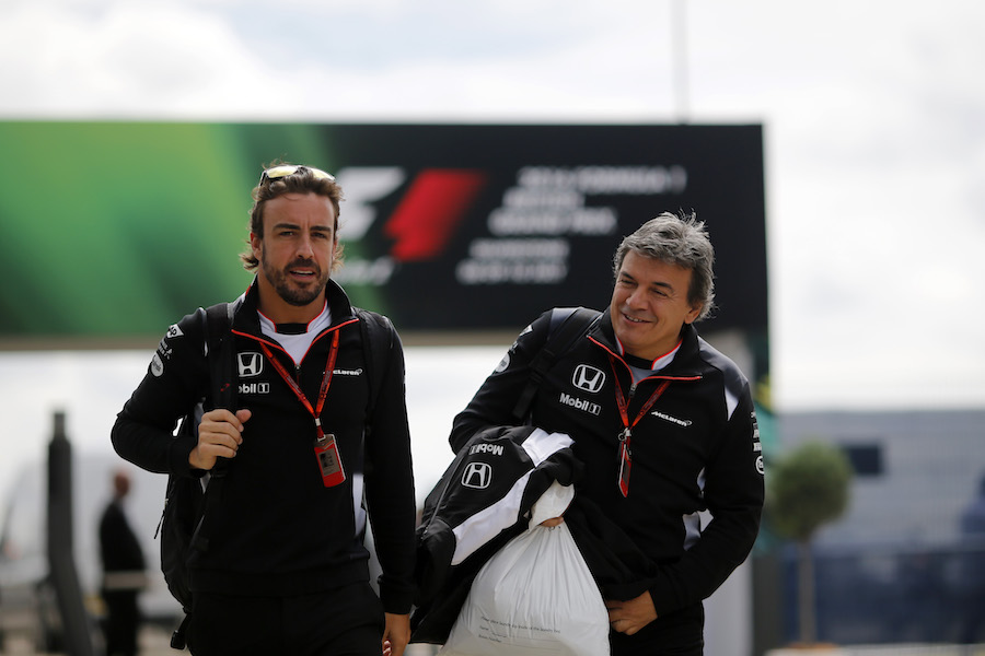 Fernando Alonso arrives at the paddock