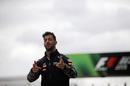 Daniel Ricciardo pose for a camera