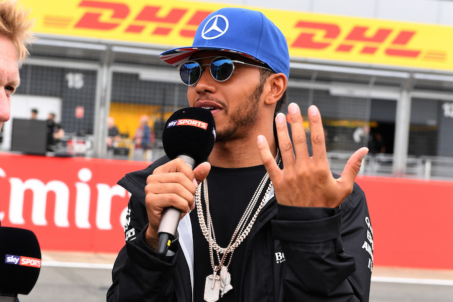 Lewis Hamilton speaks to media