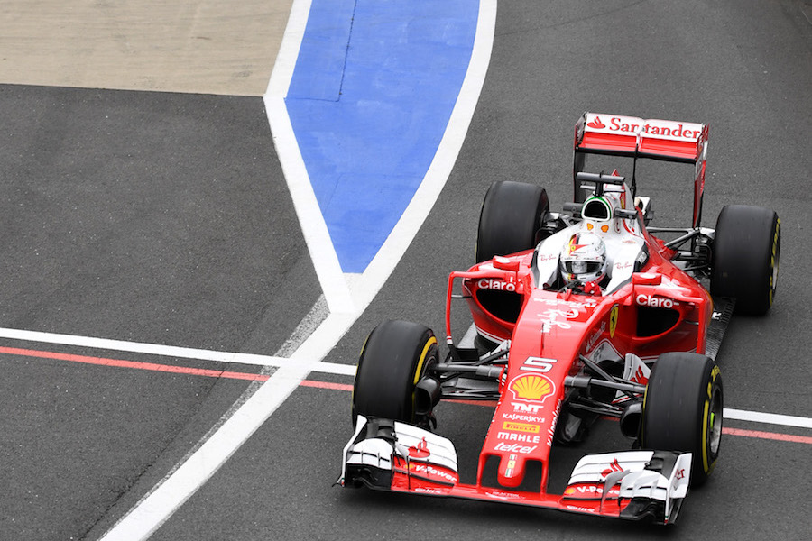 Sebastian Vettel exits the pit lane