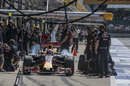 Daniel Ricciardo makes a pit stop during FP2