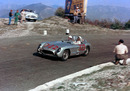 Stirling Moss on his way to victory at the Mille Miglia