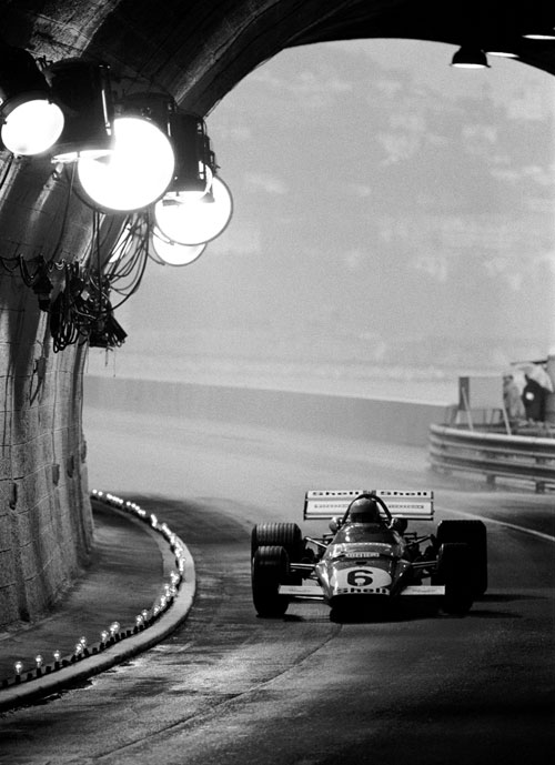 Mario Andretti heads through the specially lit tunnel at Monaco