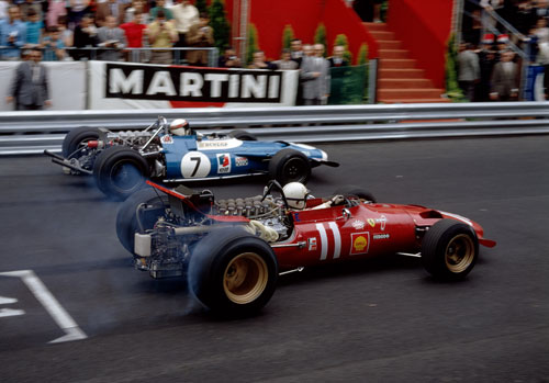 Chris Amon and Jackie Stewart vie for position away from the start