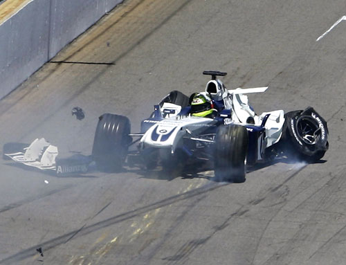 Ralf Schumacher spins away after hitting the wall during the United States Grand Prix