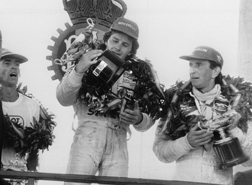 Gilles Villeneuve celebrates winning the Spanish Grand Prix