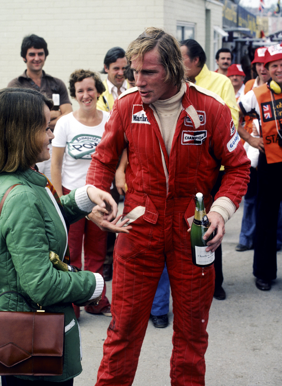 James Hunt celebrates victory at the British Grand Prix - disqualification came later