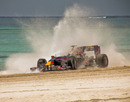 Jaime Alguersuari drives a Red Bull into the sea