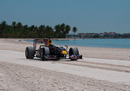 Jaime Alguersuari drives down a beach