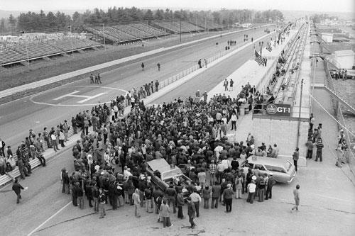 An early morning Sunday church service conducted in the pits after the tragic death of Francois Cevert