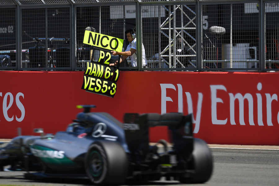 Nico Rosberg passes his pit board
