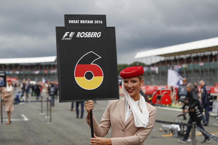 A grid girl pose ahead of the race