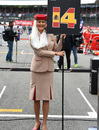 A grid girl pose ahead of the race