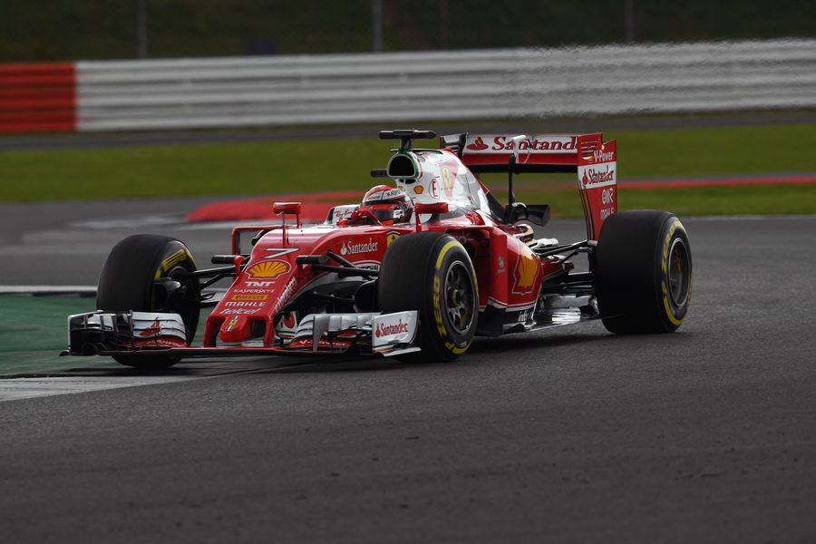 Kimi Raikkonen on track in the Ferrari with puttting soft tyres