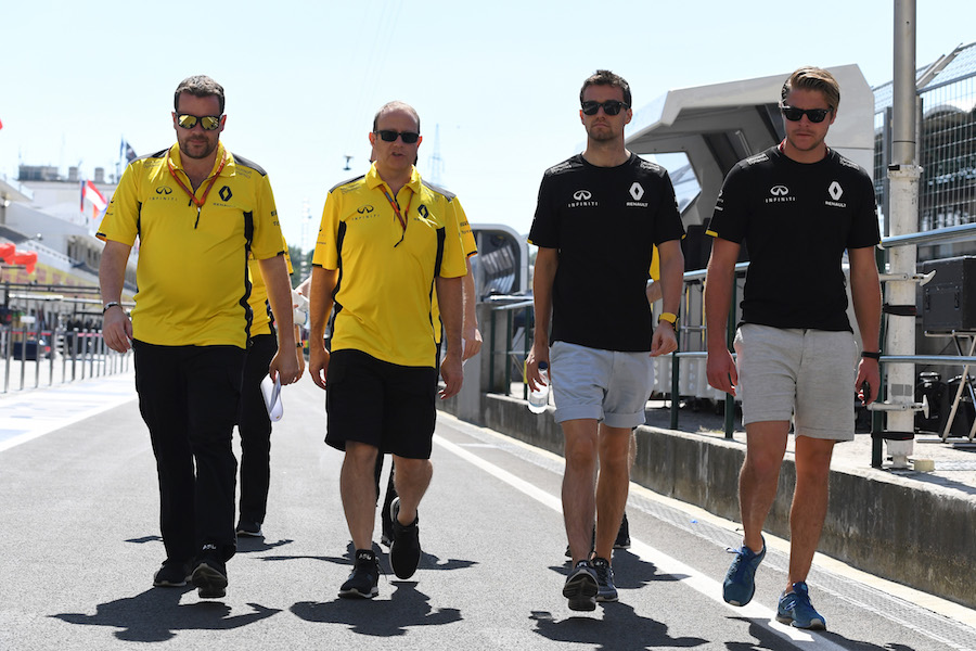 Jolyon Palmer walks the Hungaroring with his engineers