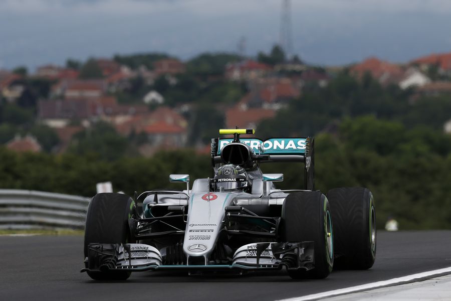 Nico Rosberg on track in the Mercedes with intermediate tyres