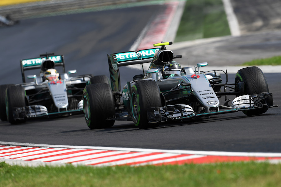 Nico Rosberg puts on the intermediate tyres