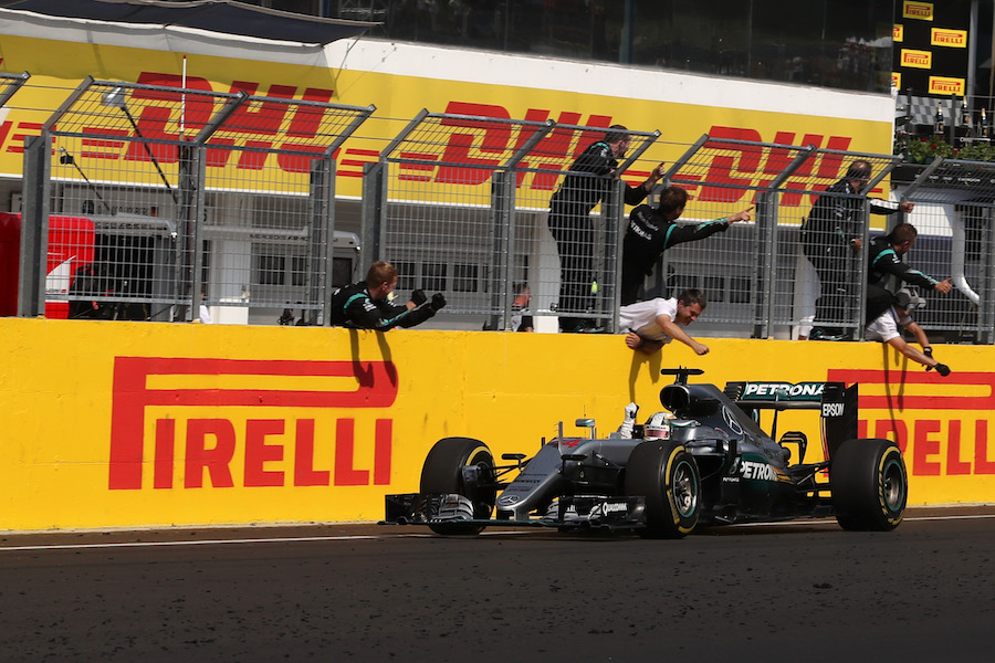 Lewis Hamilton celebrates his win
