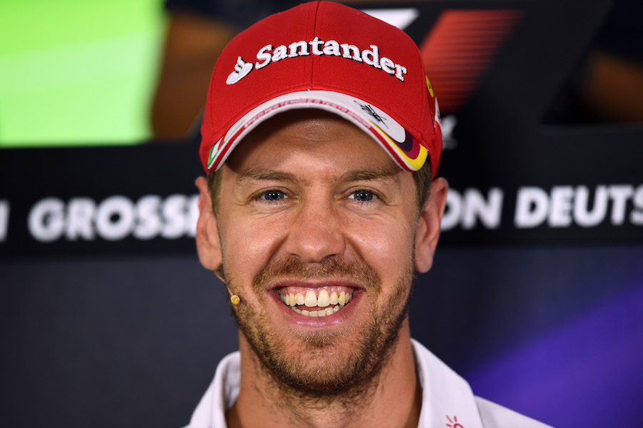 A smiling Sebastian Vettel during the Thursday press conference