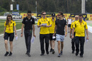 Jolyon Palmer and Esteban Ocon walk the track