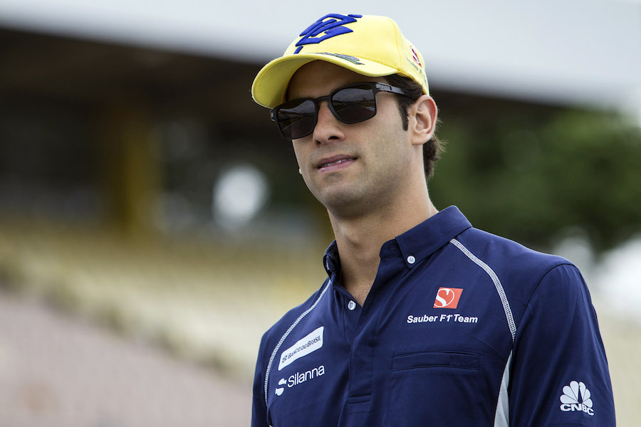 Felipe Nasr walks through the paddock