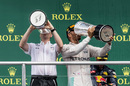 Lewis Hamilton celebrates his win with the champagne