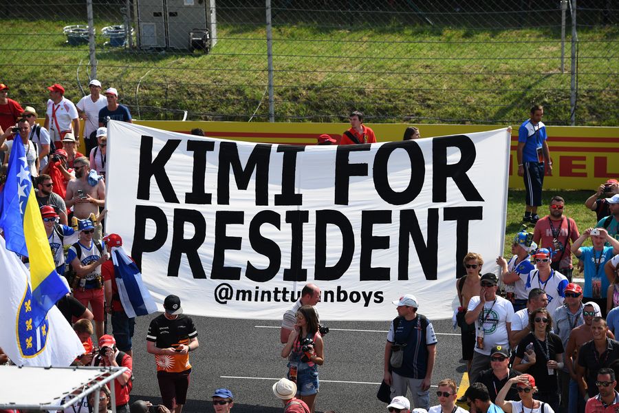 Kimi Raikkonen fans shows a banner of 