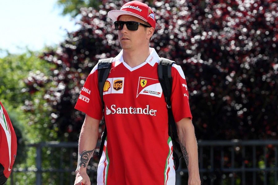 Kimi Raikkonen arrives the paddock on Thursday