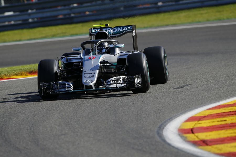 Nico Rosberg on track in the Mercedes with halo