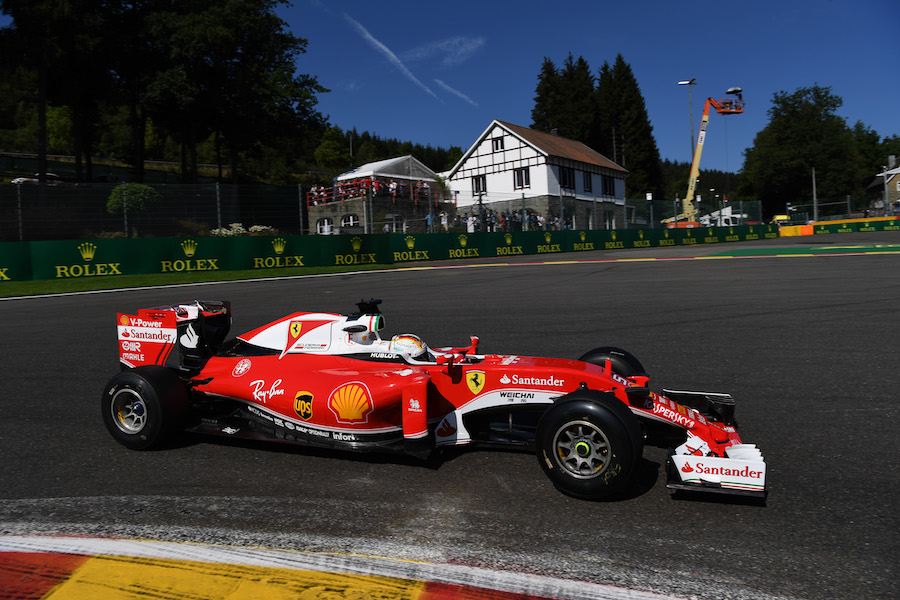 Sebastian Vettel puts on a set of prototype tyres