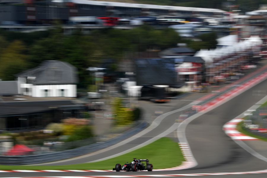 Fernando Alonso accelerates up Eau Rouge