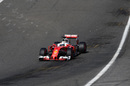 Sparks fly from Sebastian Vettel's Ferrari