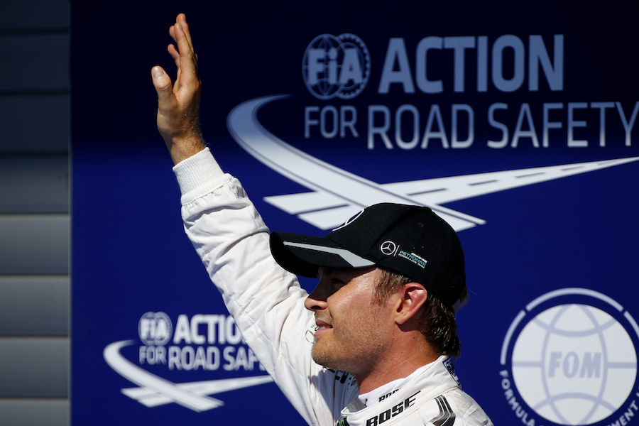 Nico Rosberg waves a hand to fans