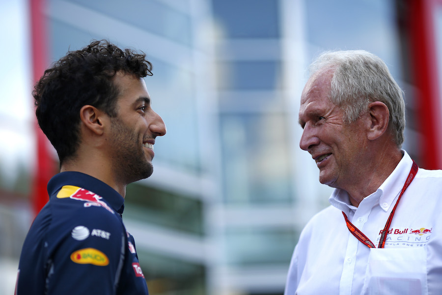 Daniel Ricciardo talks with Helmut Marko in the paddock