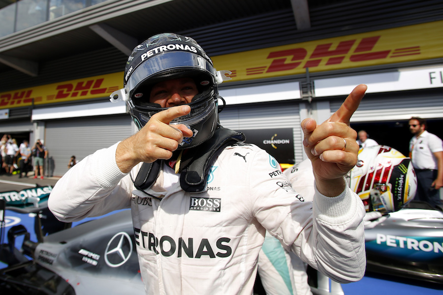 Nico Rosberg cereblates his win in the parc ferme