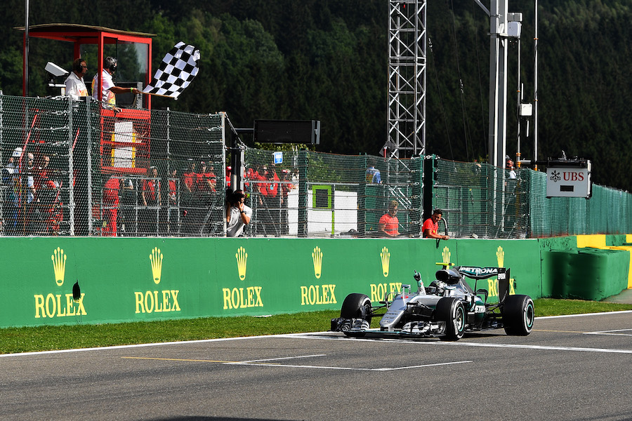 Nico Rosberg takes the chequered flag
