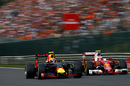 Max Verstappen and Kimi Raikkonen battle for a position