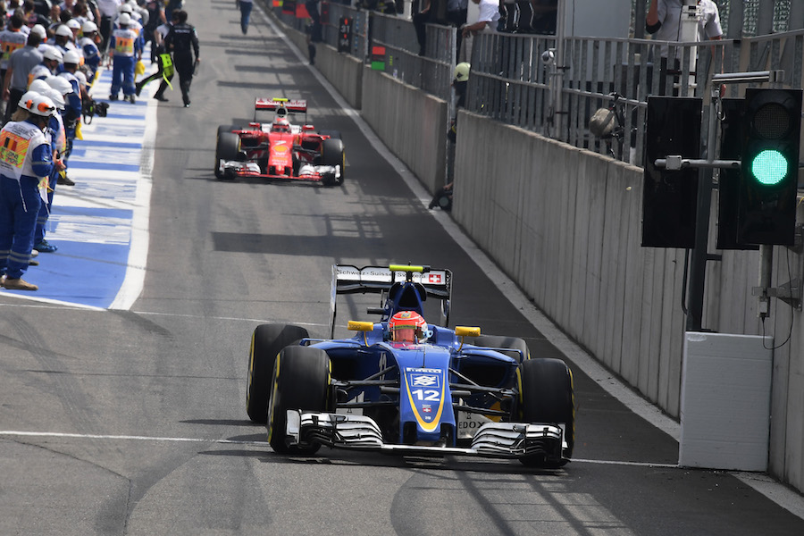 Felipe Nasr exits pit lane for the restart