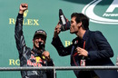 Mark Webber drinks champagne from Daniel Ricciardo's boot