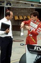 Ayrton Senna and Frank Williams discuss progress in testing at Donington in 1983