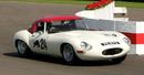 Adrian Newey races a Jaguar E-type at Goodwood
