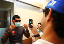 HRT drivers Karun Chandhok and Bruno Senna visit ta local hospital