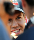Sebastian Vettel talks to reporters 