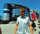 Jenson Button leaves the McLaren motor home