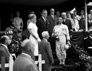 Stirling Moss collects the trophy from Prince Rainier and Princess Grace of Monaco