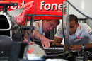 Lewis Hamilton takes a look at his McLaren MP4/25 