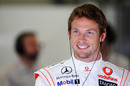 A relaxed Jenson Button in the garage