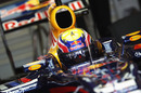 Mark Webber sits in his Red Bull