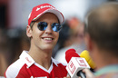 Sebastian Vettel smiles during the media interview