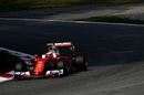 Kimi Raikkonen behind the wheel of the Ferrari in qualifying
